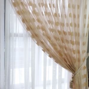 Κουρτίνα διάφανη με ανάγλυφο καφέ σχέδιο σε διαστάσεις 2,10 χ 2,19 ύψος