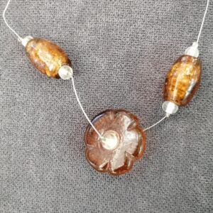 Δέστρα διάφανη σε μελί απόχρωση και σχέδιο μαργαρίτα με διάσταση 42 εκατοστά