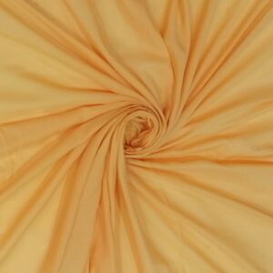 Υφασμα από γάζα βαμβακερή σε κίτρινη απόχρωση με φάρδος τοπιού 2.80 μέτρα.