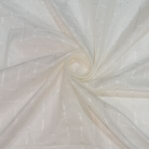 Ύφασμα από ανάγλυφη γαζα σε μπέζ απόχρωση με καρώ σχέδιο και φάρδος τοπιού 2,80 μέτρα.