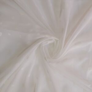 Υφασμα από διάφανη γάζα σε λευκή απόχρωση με σχέδιο λευκές βούλες και με φάρδος τοπιού 2.80 μέτρα.