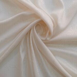 Υφασμα αναγλυφο ζακαρ με σχέδιο λουλούδι και αζουρ στο τελείωμα και φαρδος τοπιού 2.80 μέτρα.